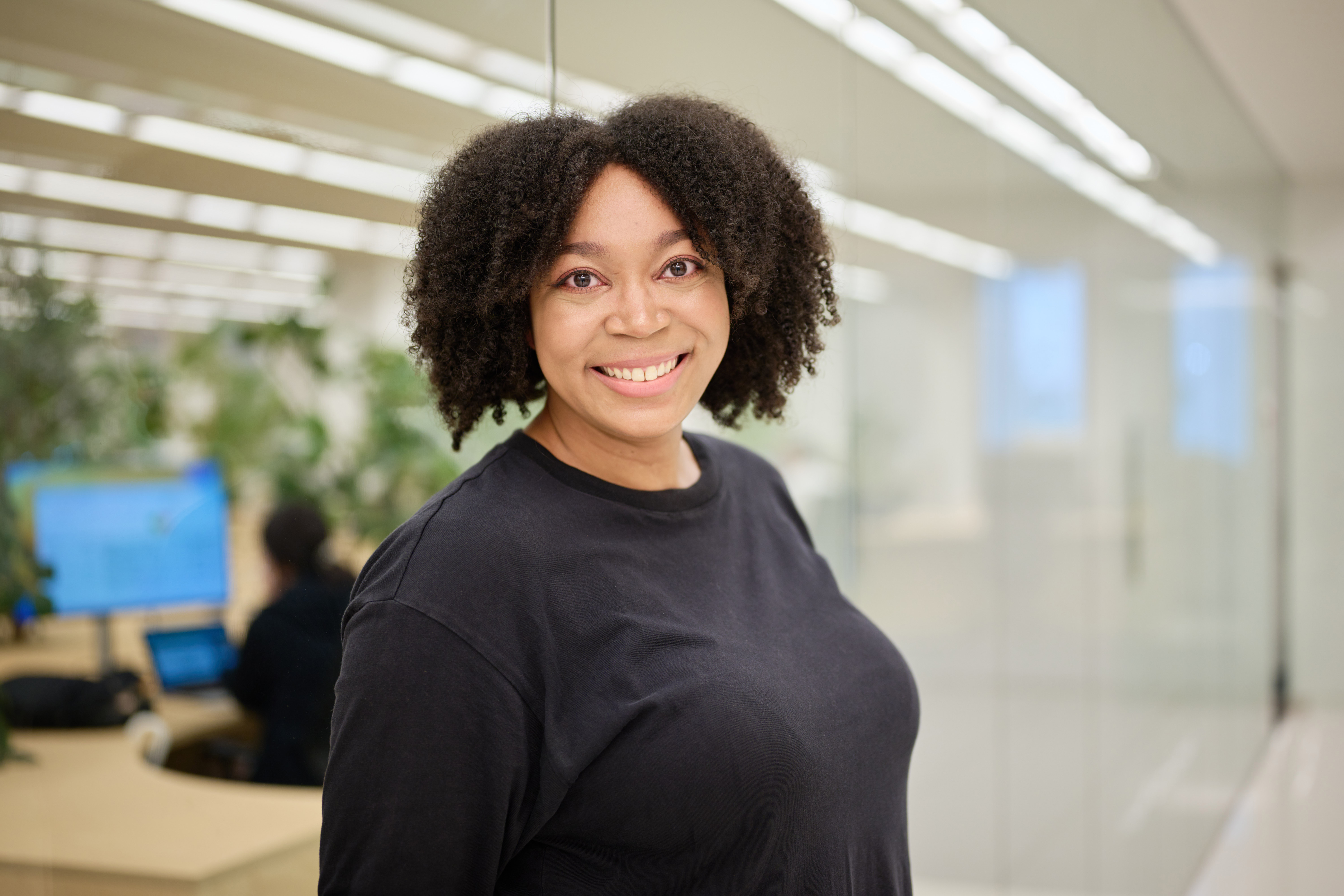 One of HENNGE's employees working in the office headquarters